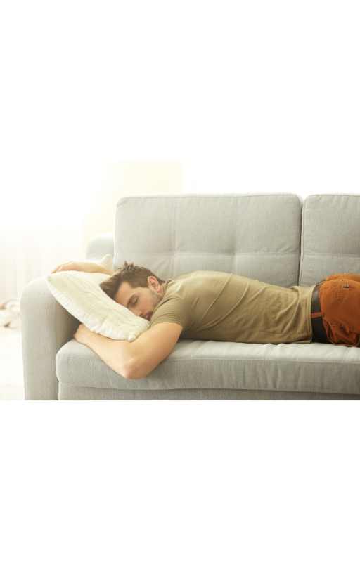 man sleeping on sofa