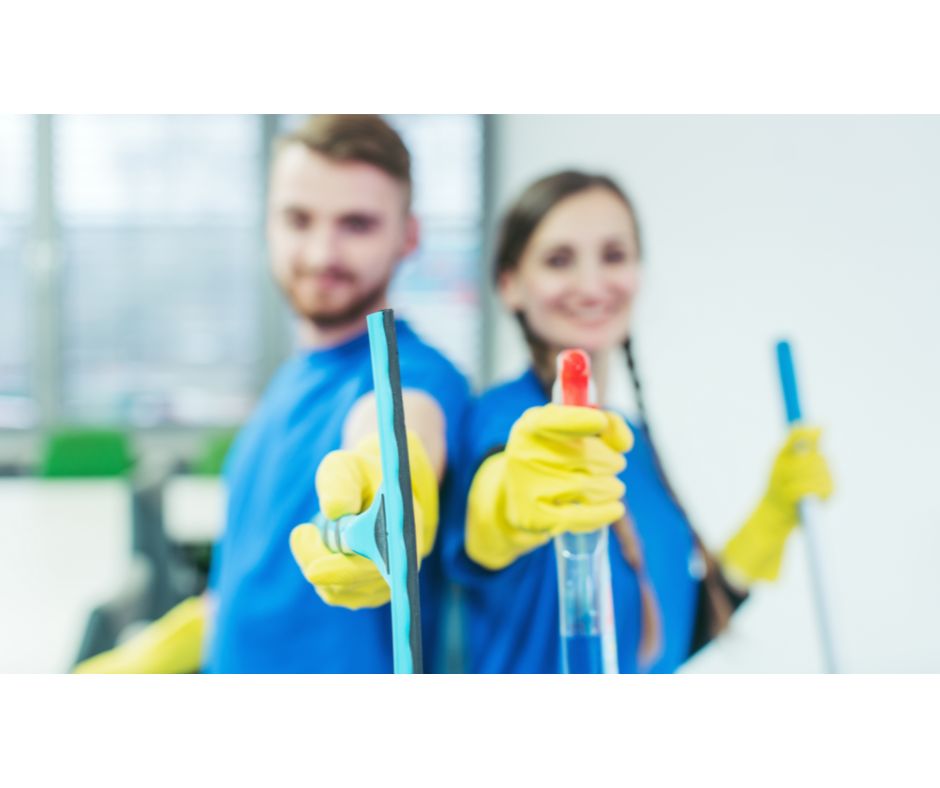 picture of house cleaners smiling
